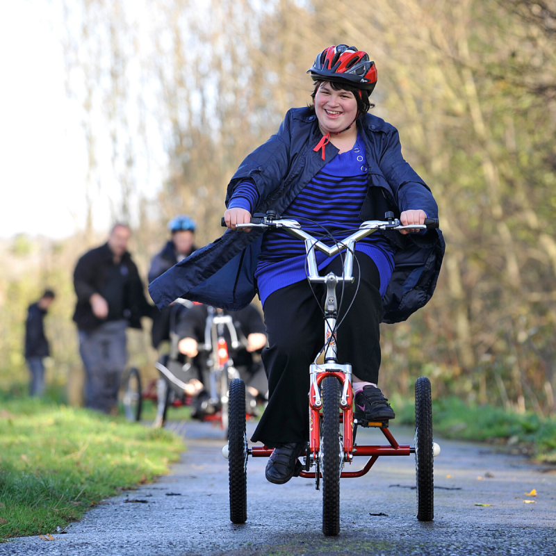 Girl cycling on trike